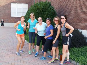 A group of women promoting health and fitness challenges to encourage a healthier lifestyle.